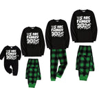 We Are Family 2026 Christmas Pajamas Set - Black Top Green and Black Plaid Pants White Text Graphic