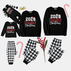 2026 Family Christmas Text Print Black Long Sleeve Top with Black And White Plaid Pants Family Matching Pajamas